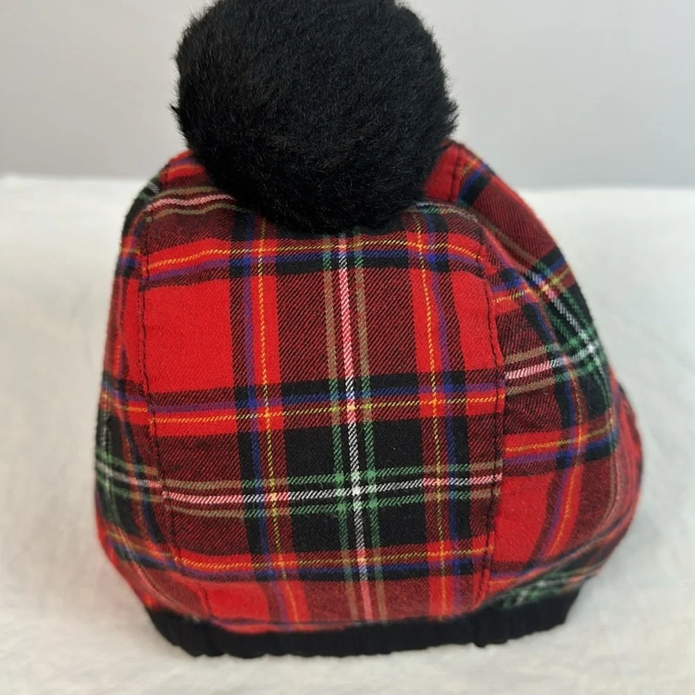 Plaid baby hat with black pom pom